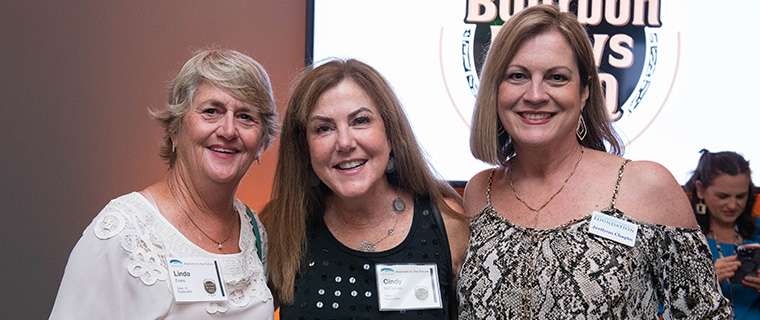 Graduates celebrating achievement